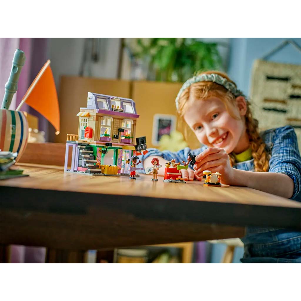 LEGO® Friends: Musikgeschäft und Wohnung (42653) kép 8